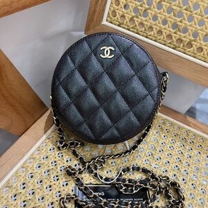 CHANEL Quilted Black Mini Round Bag